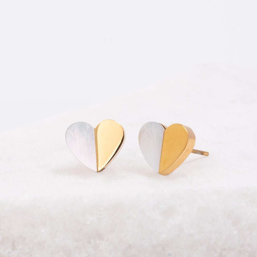 Photo of heart shaped earrings, mother of pearl and 14k gold plated stainless steel studs, Starfish Project, hope symbol, best fair trade jewelry company