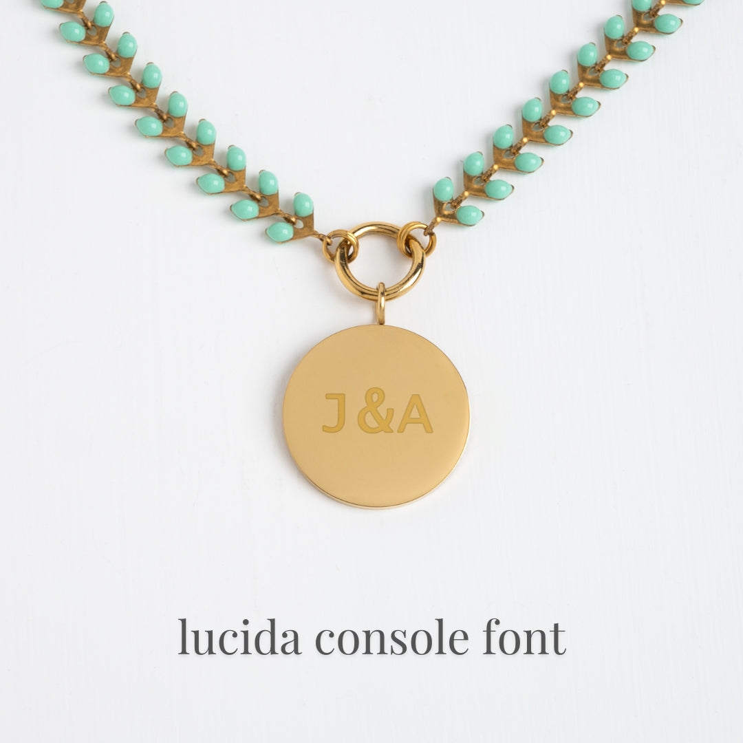 Example photo of engravable necklace, fair trade businesses, gold engravable necklace for women, gold and mint chain, various fonts
