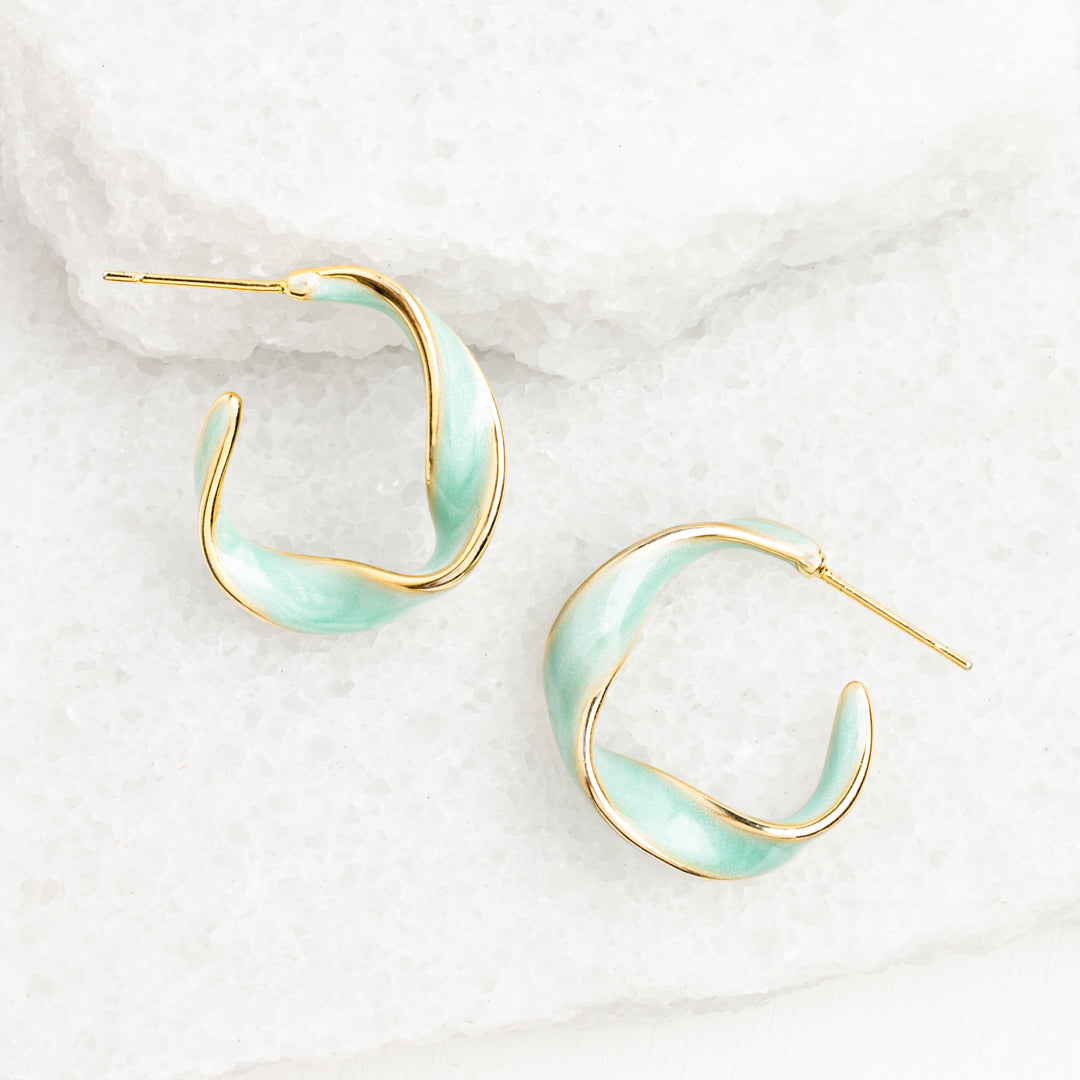 Photo of mint colored and gold earrings, mint hoops, gold earrings, sustainable fair trade jewelry, 14k gold, women's earrings