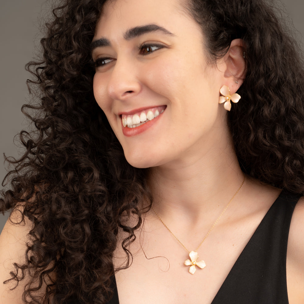 Woman wearing matching earring and necklace set, floral jewelry rose gold jewelry, deals, unique christmas gifts