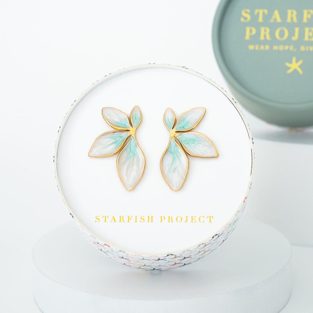 Photo of green and gold earrings in a colorful gift box, Starfish Project, beautiful earrings, women's jewelry, best fair trade business