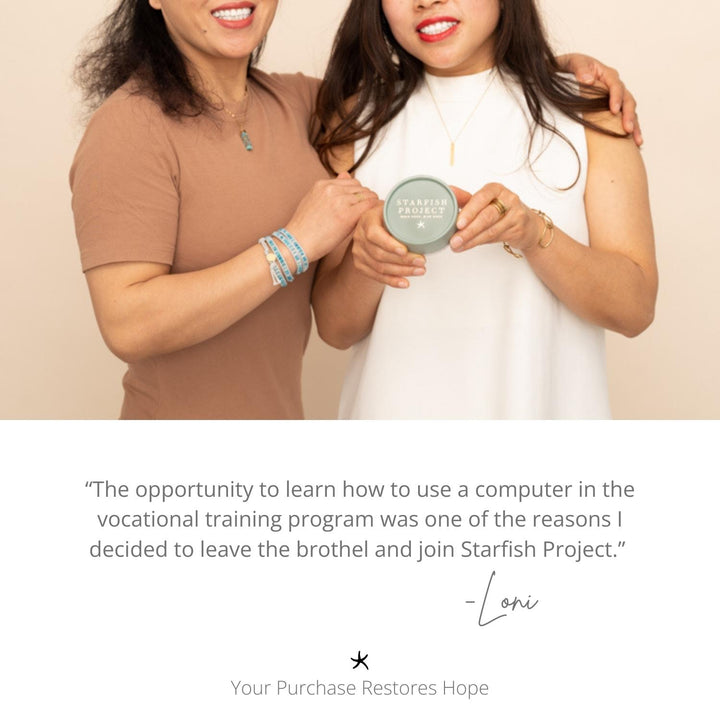 Photo of two women smiling while showing various quality jewelry pieces, golds and colorful women's jewelry, symbolism for hope, meaningful jewelry, jewelry website