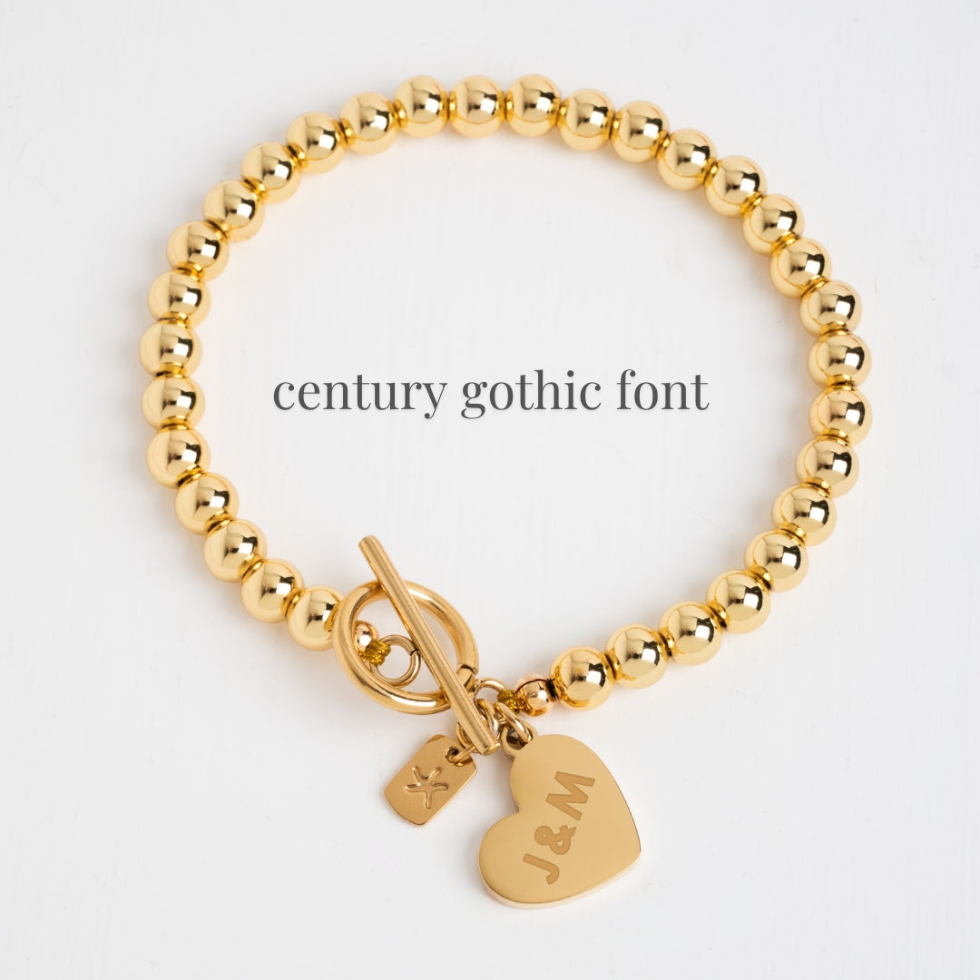 Example photo of engravable bracelet, fair trade businesses, gold engravable bracelet for women, gold beads
