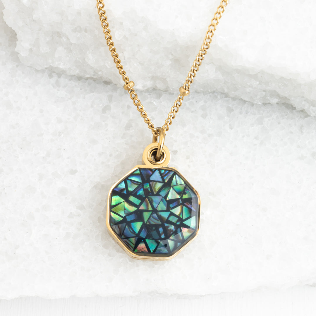 Photo of gold necklace with abalone, locket, shell necklace, gold and green jewelry, jewelry shops, fair trade quality jewelry