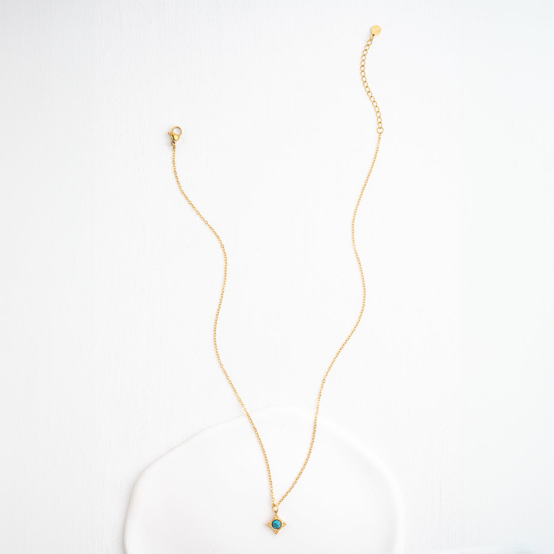 Minimalistic gold and turquoise pendant, adjustable necklace chain, gold chain, white background, xmas present
