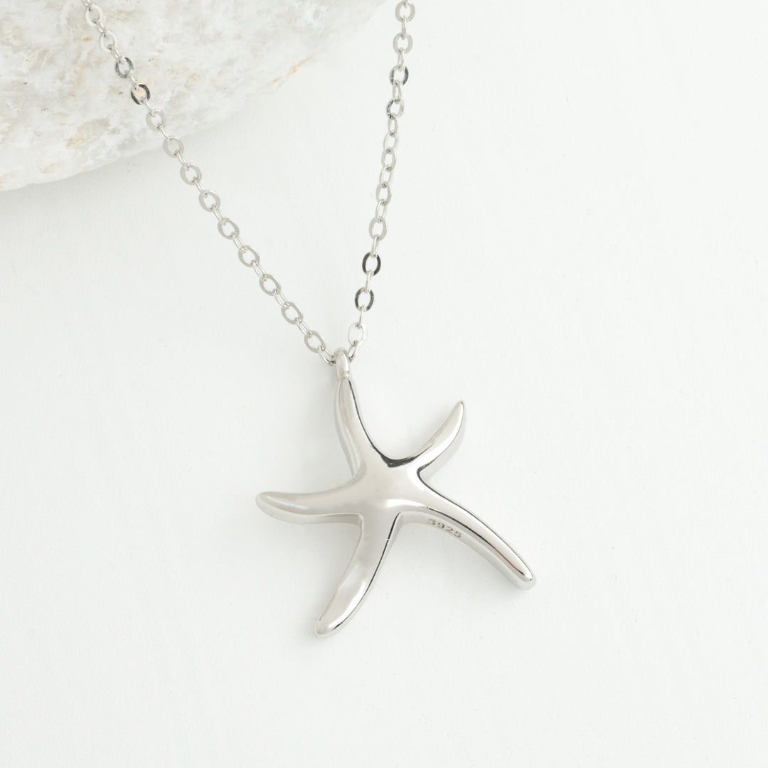 A silver necklace with a starfish shaped pendant, silver necklaces for women, sterling silver jewelry, cute necklaces, ocean necklaces for women