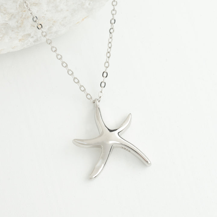 A silver necklace with a starfish shaped pendant, silver necklaces for women, sterling silver jewelry, cute necklaces, ocean necklaces for women