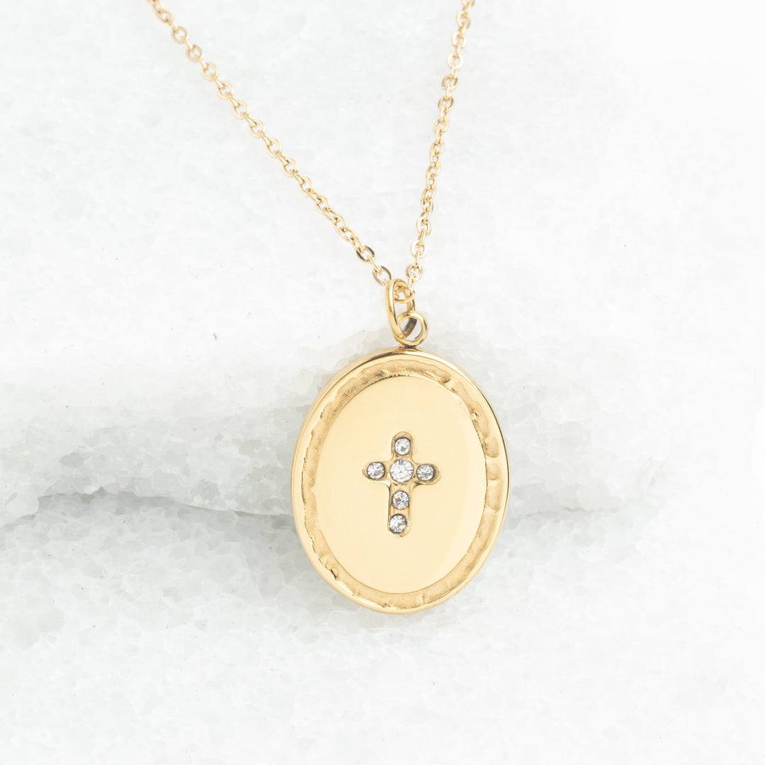 Women's jewelry, 14k plated Gold necklace with a cross pendant on a marble surface, symbol of hope, jewelry design, best xmas gift