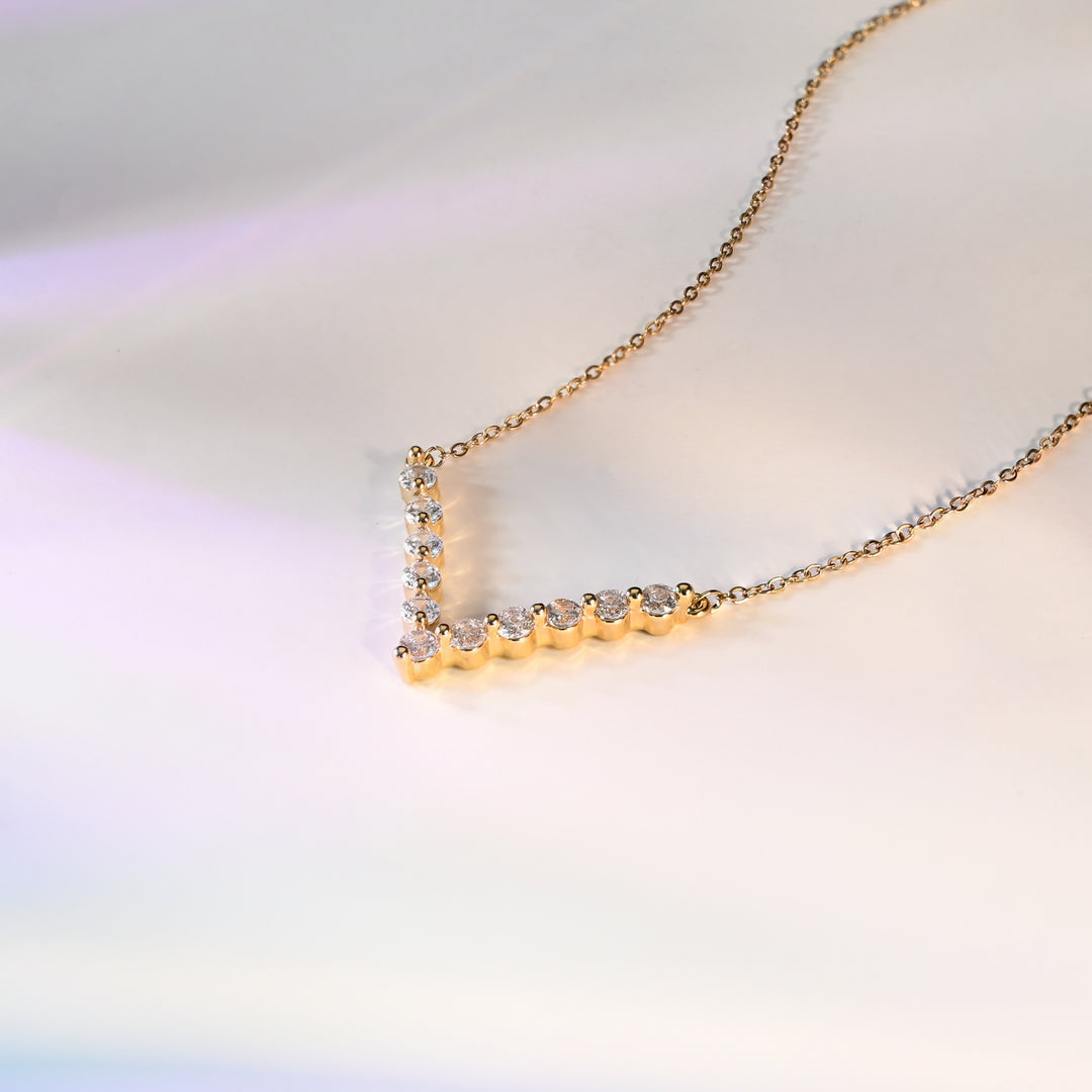 Close up photo of gold quality wedding day necklace, fair trade jewelry market, artisan women's jewelry