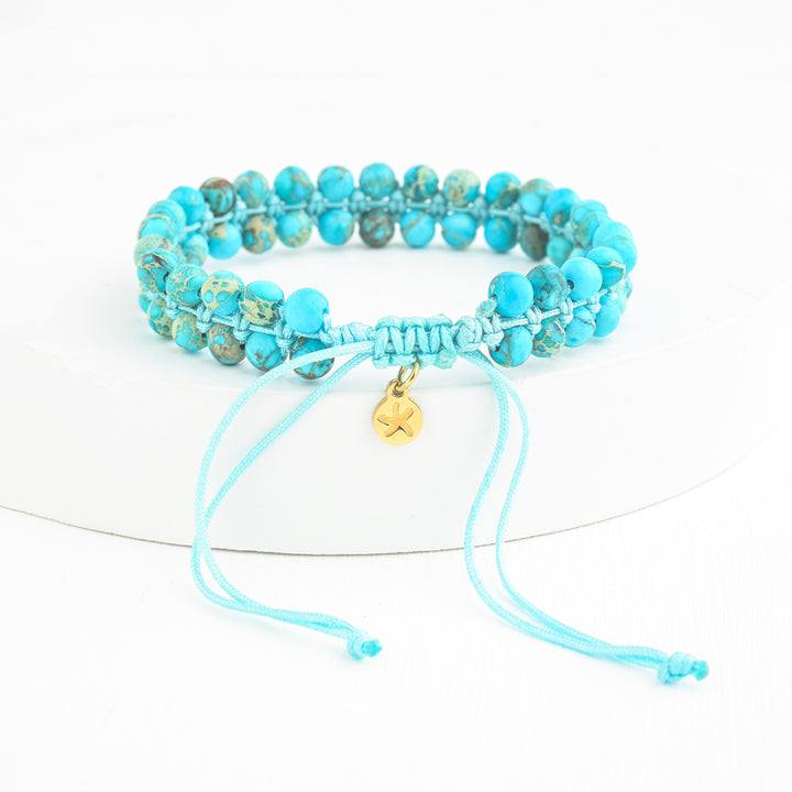 Bracelet with Starfish logo, starfish symbolism, symbolism for hope, gold shaded bracelet, jewelry organization