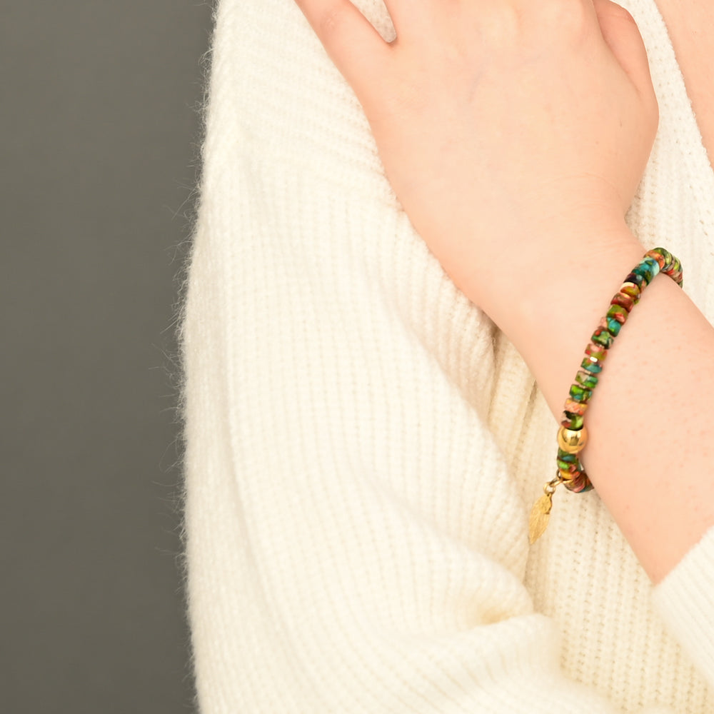 Model photo of colorful hematite and gold bracelet, stretch bracelet, beaded bracelet, unique christmas gift