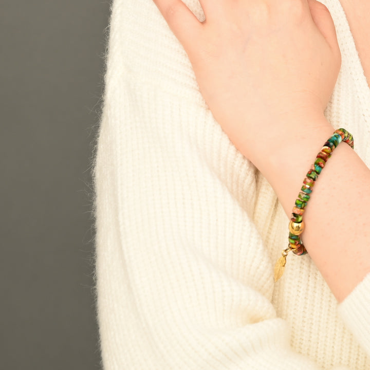 Model photo of colorful hematite and gold bracelet, stretch bracelet, beaded bracelet, unique christmas gift