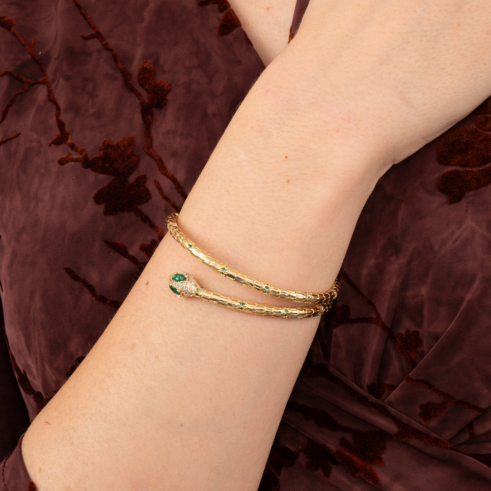 Woman wearing a gold bracelet cuff, jewelry website, fashion jewelry, bracelet company
