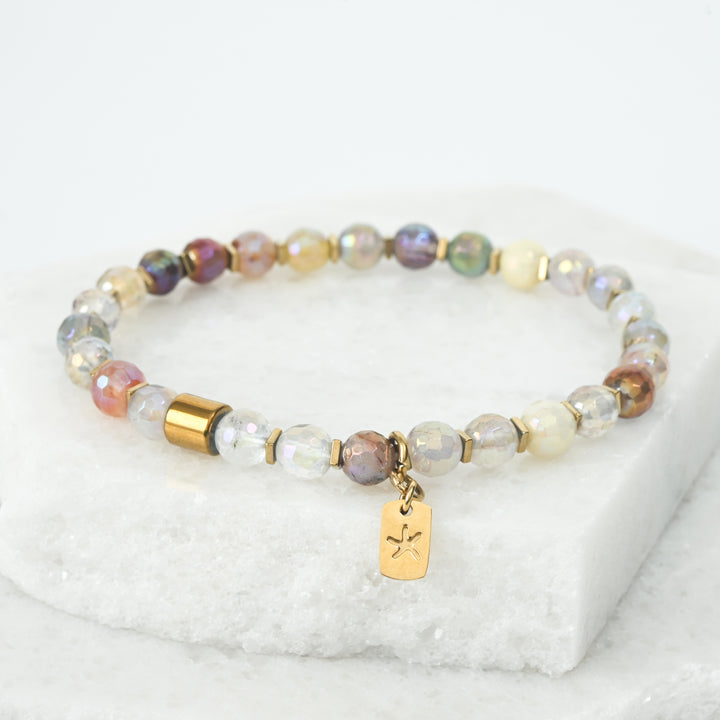 Photo of colorful gemstone bracelet, 14k gold plated stainless steel bracelet, hematite bracelet, gold starfish logo, women's bracelets