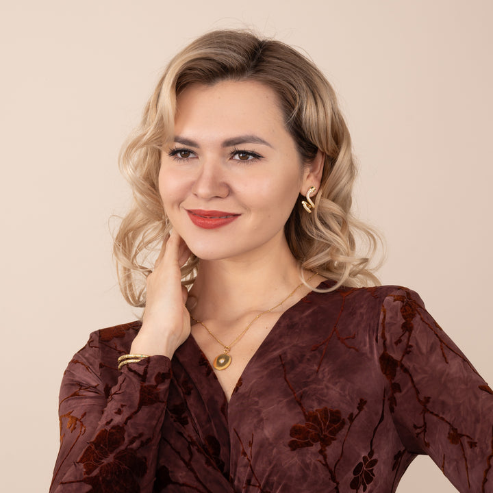 Woman wearing engraved necklace, necklaces with a message, jewelry website