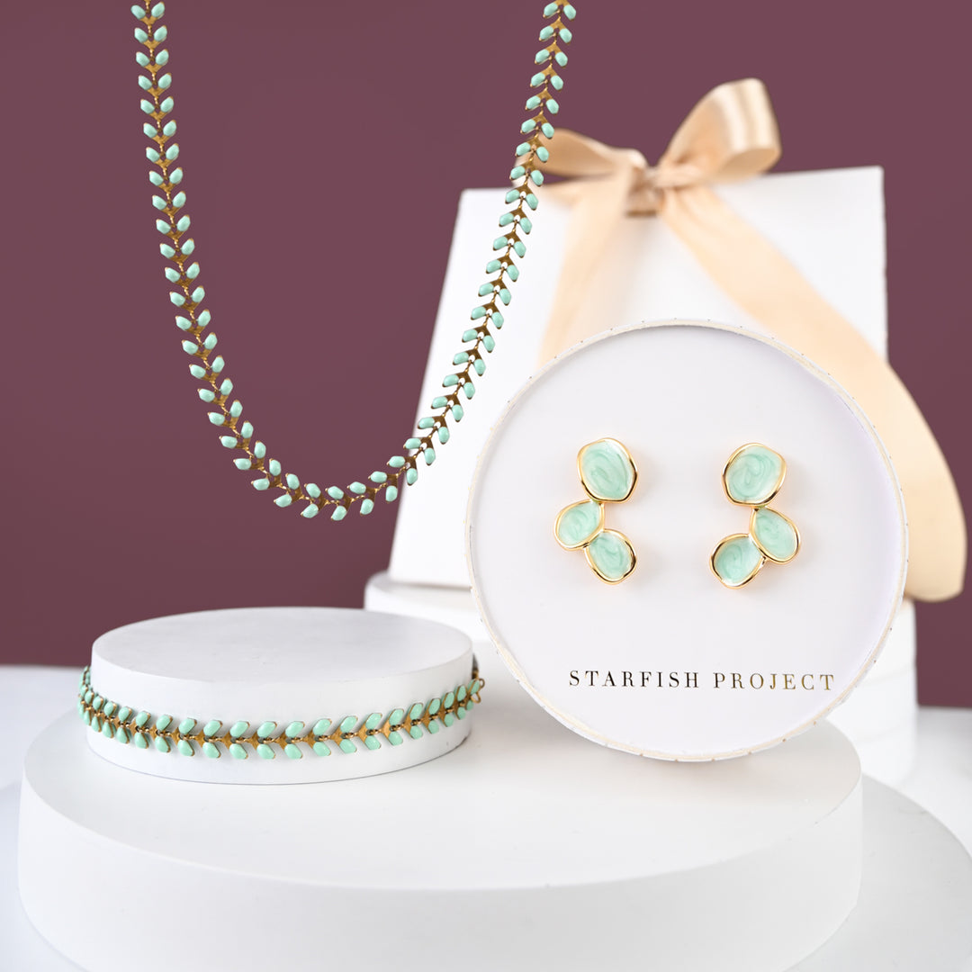 Gold jewelry gift set, jewelry set with mint green and gold pieces, gift set deals, green gift sets, best fair trade gifting companies