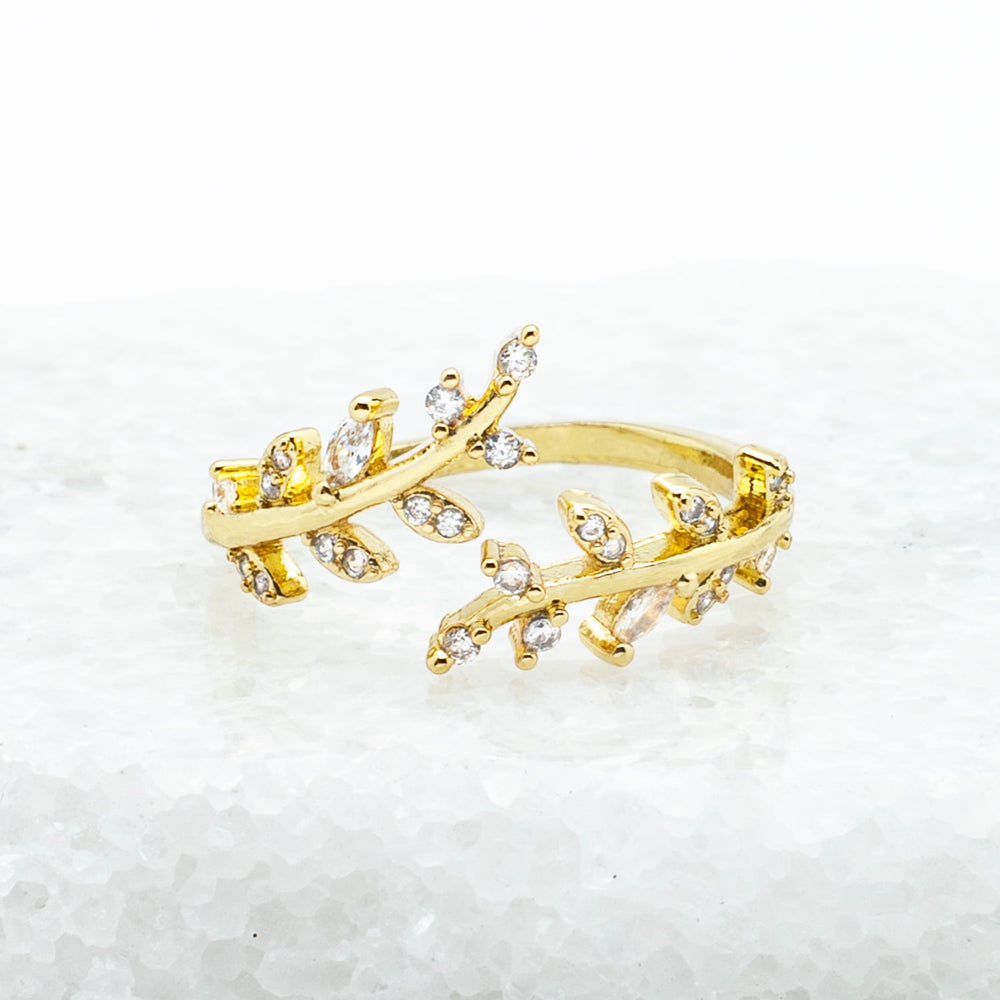 Willow branch ring in 18K plated gold and adorned with shimmering zircon stones