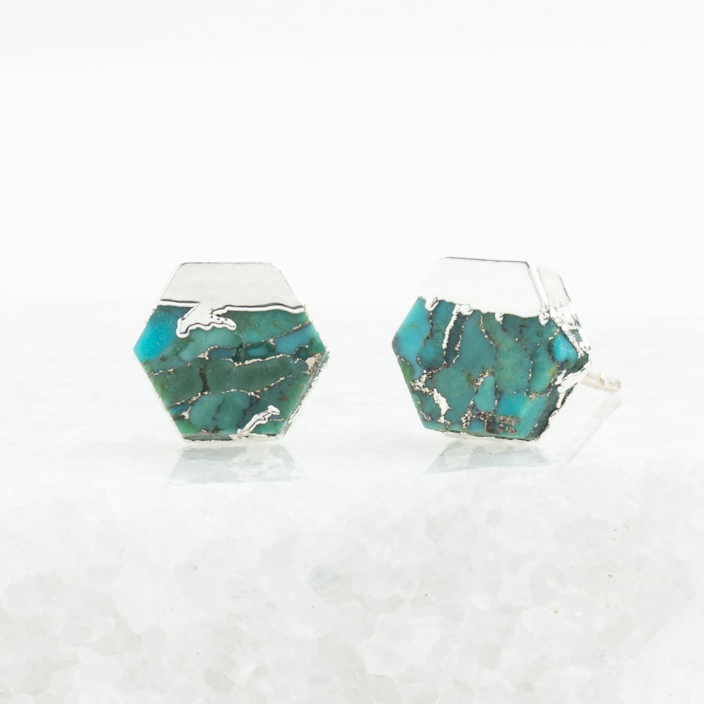 A pair of beautiful silver studs, fair trade high quality cute earrings with unique turquoise stones set against a marble background. great Christmas present (Xmas gift), Mother's Day gift