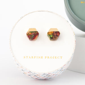 Photo of beautiful colorful earrings placed in round gift box, Starfish Project, women's fair trade jewelry business, surprises for Christmas present, great Mother's day gift