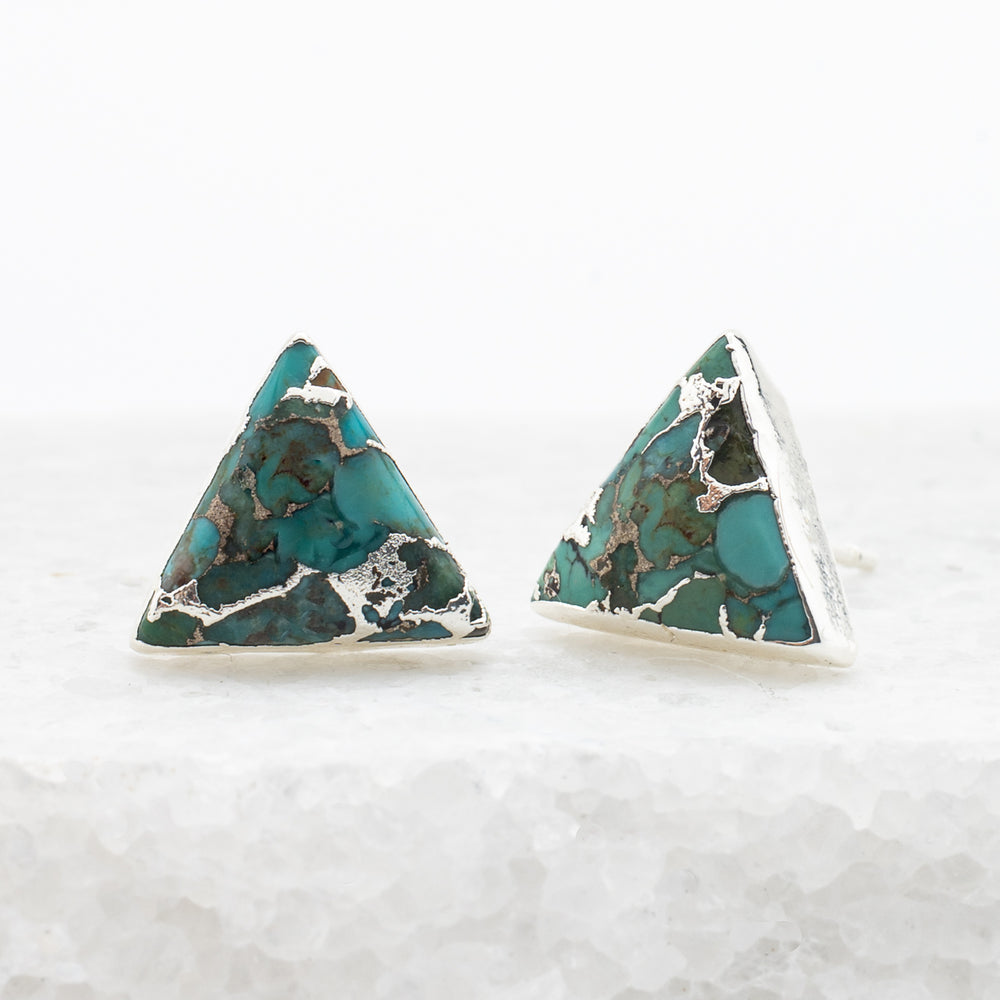A pair of natural turquoise and silver studs, sustainable fair trade jewelry, women's jewelry, beautiful and quality earrings set against a marble background. Great Christmas present (unique xmas gift), present for Mother's day 