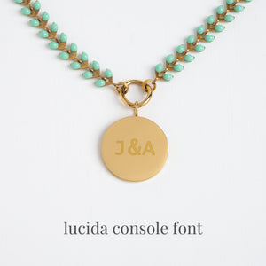 Example photo of engravable necklace, fair trade businesses, gold engravable necklace for women, gold and mint chain, various fonts