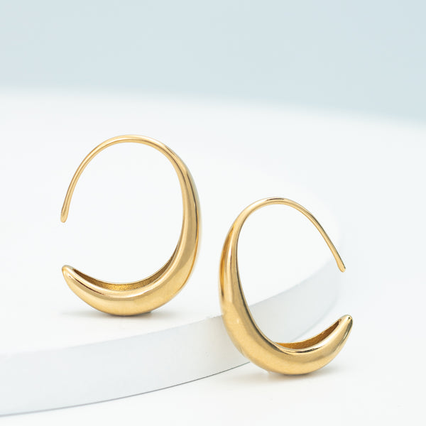 Side by side photo of golden hoop set, golds, online jewelry store, jewelry like pandora, fair trade women's jewelry