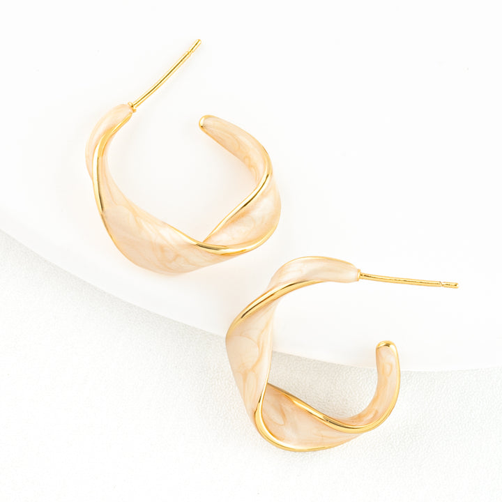 With a Twist Hoops in Soft Coral