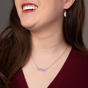 Woman wearing engravable necklace, necklaces with a message, jewelry website, silver bar necklace for women