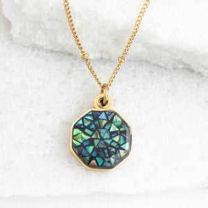 Photo of gold necklace with abalone, locket, shell necklace, gold and green jewelry, jewelry shops, fair trade quality jewelry