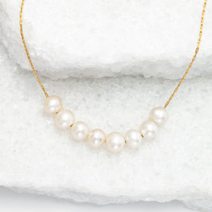 Photo of gold necklace with pearls, necklace with pearl pendant, wedding jewelry, bridal gold necklaces, ocean jewelry