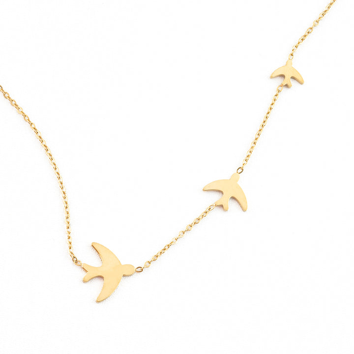 Beautiful gold necklace, gold bird necklace, women's fashion jewelry pieces, fair trade jewelry website