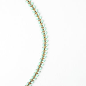 Mint and gold necklace, necklace for layering, seed-shaped necklace, necklace with symbolism, jewelry for women, women's freedom business