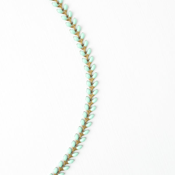 Mint and gold necklace, necklace for layering, seed-shaped necklace, necklace with symbolism, jewelry for women, women's freedom business
