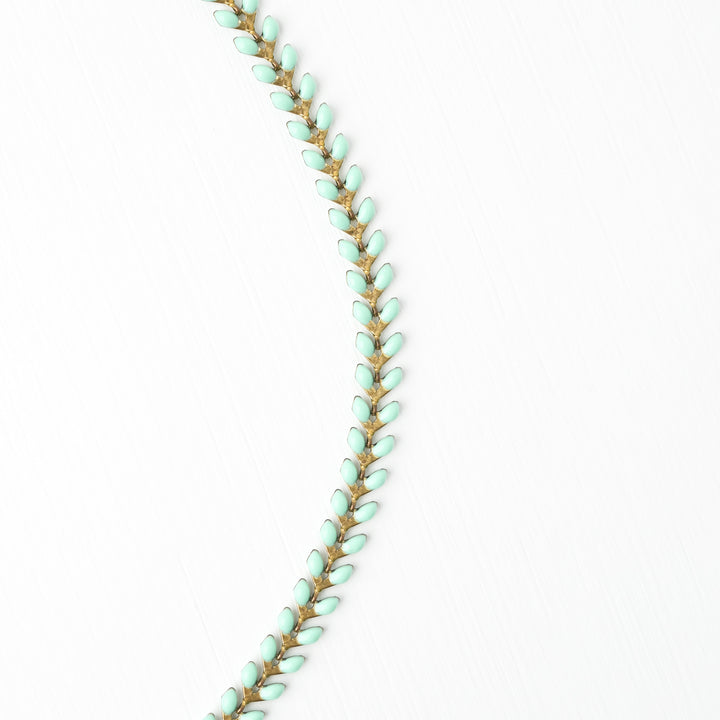 Mint and gold necklace, necklace for layering, seed-shaped necklace, necklace with symbolism, jewelry for women, women's freedom business