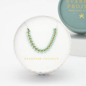 14k gold and green necklace, seed-shaped necklace, Starfish Project, jewelry brands, necklaces like pandora 