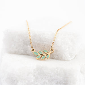 Photo of mint and gold necklace, leaf shaped necklace, simple necklace, women's jewelry, fair trade jewelry company, best fair trade gifts 