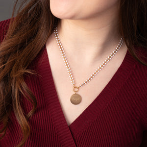 Woman wearing engraved necklace, necklaces with a message, jewelry website, ivory seed chain