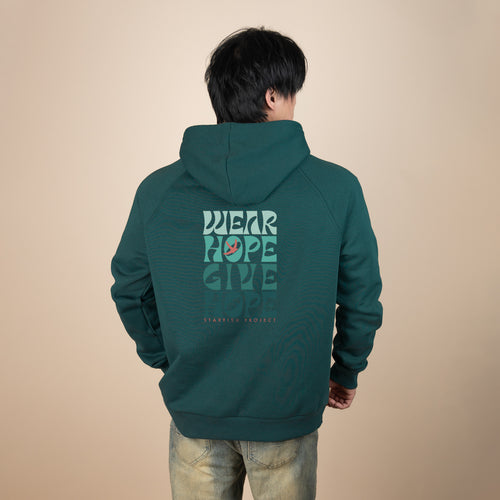 Back of man wearing teal green Wear Hope hoodie with Wear Hope Give Hope print