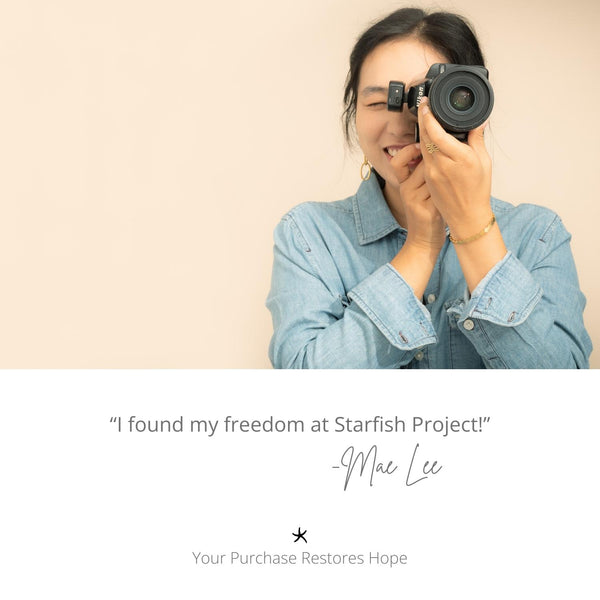 Photo of a photographer, woman holding a camera, symbol of starfish, career development, handcrafted jewelry, quality jewelry
