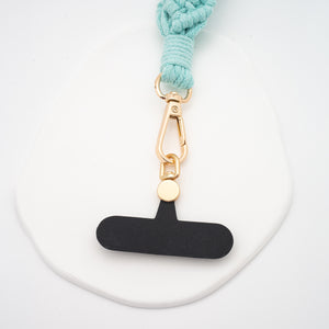 Close up of phone strap attachment, gift for mother on Mother's day, sustainable fair trade jewelry