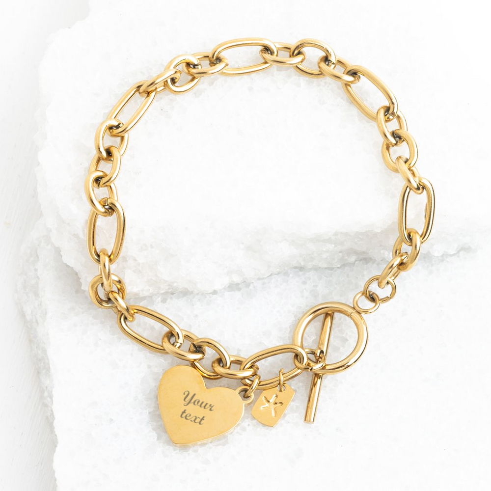 Photo of gold engravable bracelet, bracelet with heart, chained bracelet, engravable jewelry for women, heart attachment
