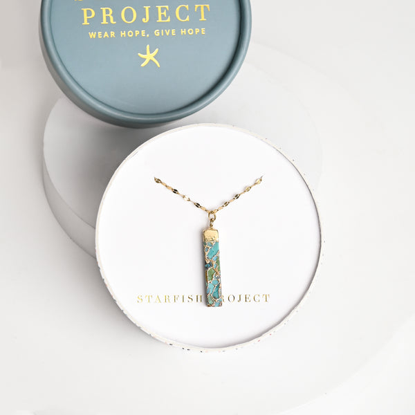 Necklace with gold shaded pendant in white gift box, Starfish Project, necklace company, jewelry web, unique xmas present ideas